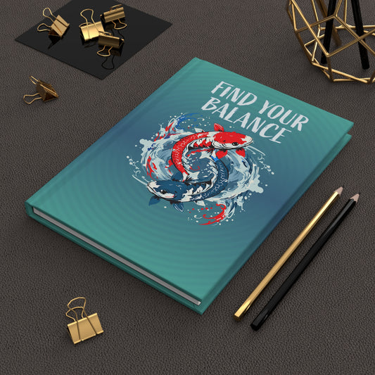 A hard bound journal with a glossy laminate finish. The diary features two koi fish in a yin yang pattern splashing out of the water